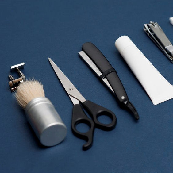  Men’s grooming products including scissors, razor, comb, etc.
